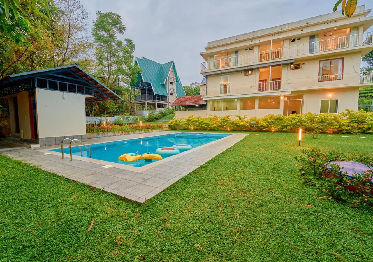 Glen Castle Vagamon Pool Resort By Voye Homes Extérieur photo