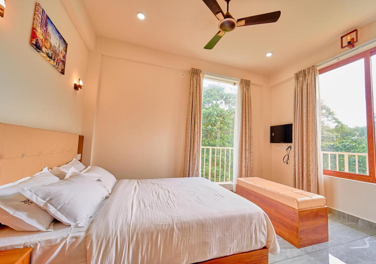 Glen Castle Vagamon Pool Resort By Voye Homes Extérieur photo