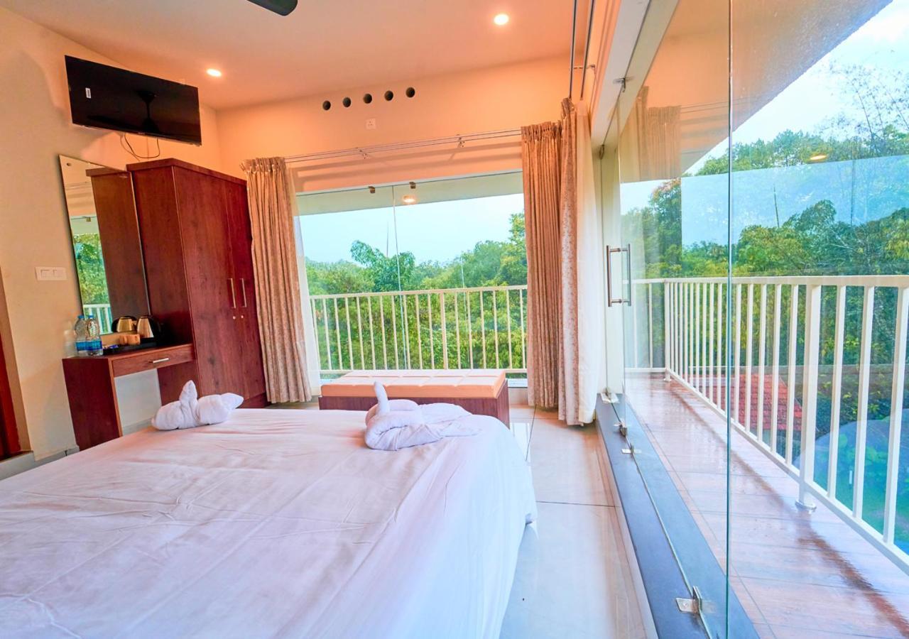 Glen Castle Vagamon Pool Resort By Voye Homes Extérieur photo