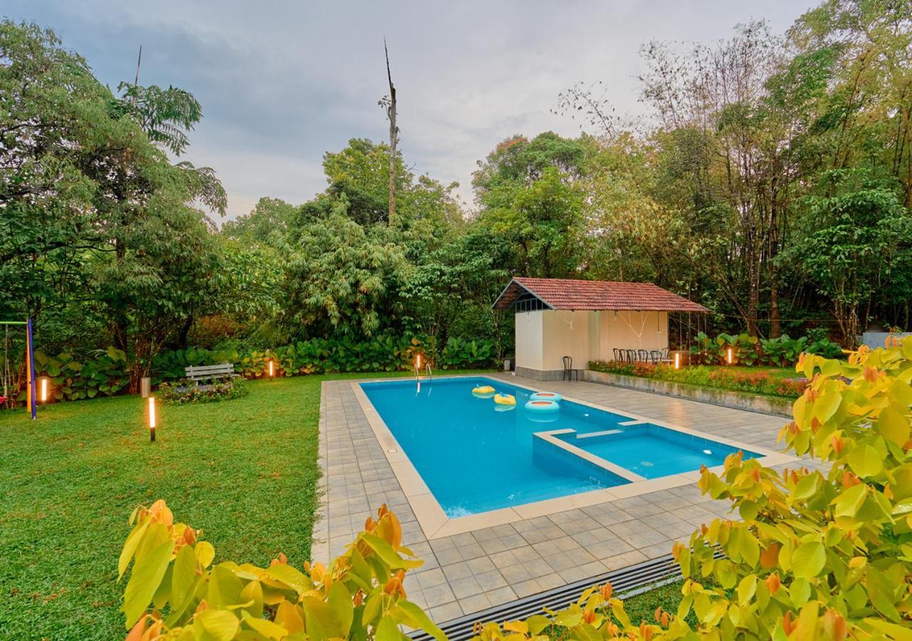 Glen Castle Vagamon Pool Resort By Voye Homes Extérieur photo