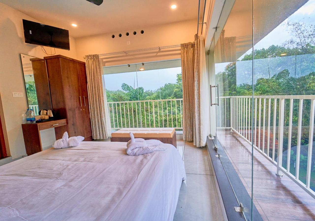 Glen Castle Vagamon Pool Resort By Voye Homes Extérieur photo