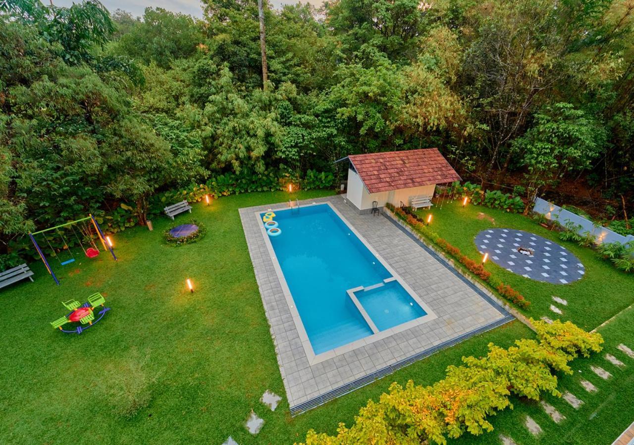 Glen Castle Vagamon Pool Resort By Voye Homes Extérieur photo