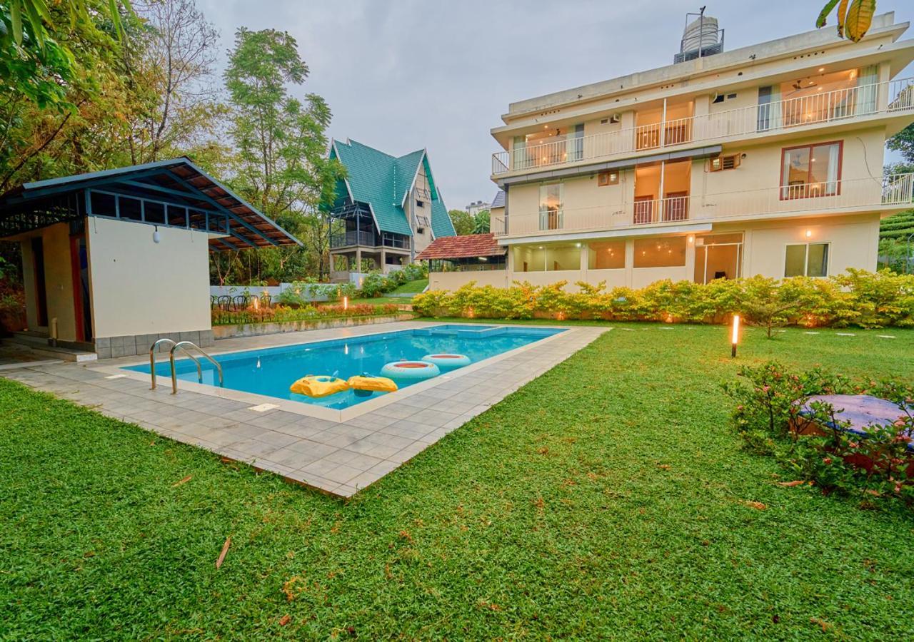Glen Castle Vagamon Pool Resort By Voye Homes Extérieur photo
