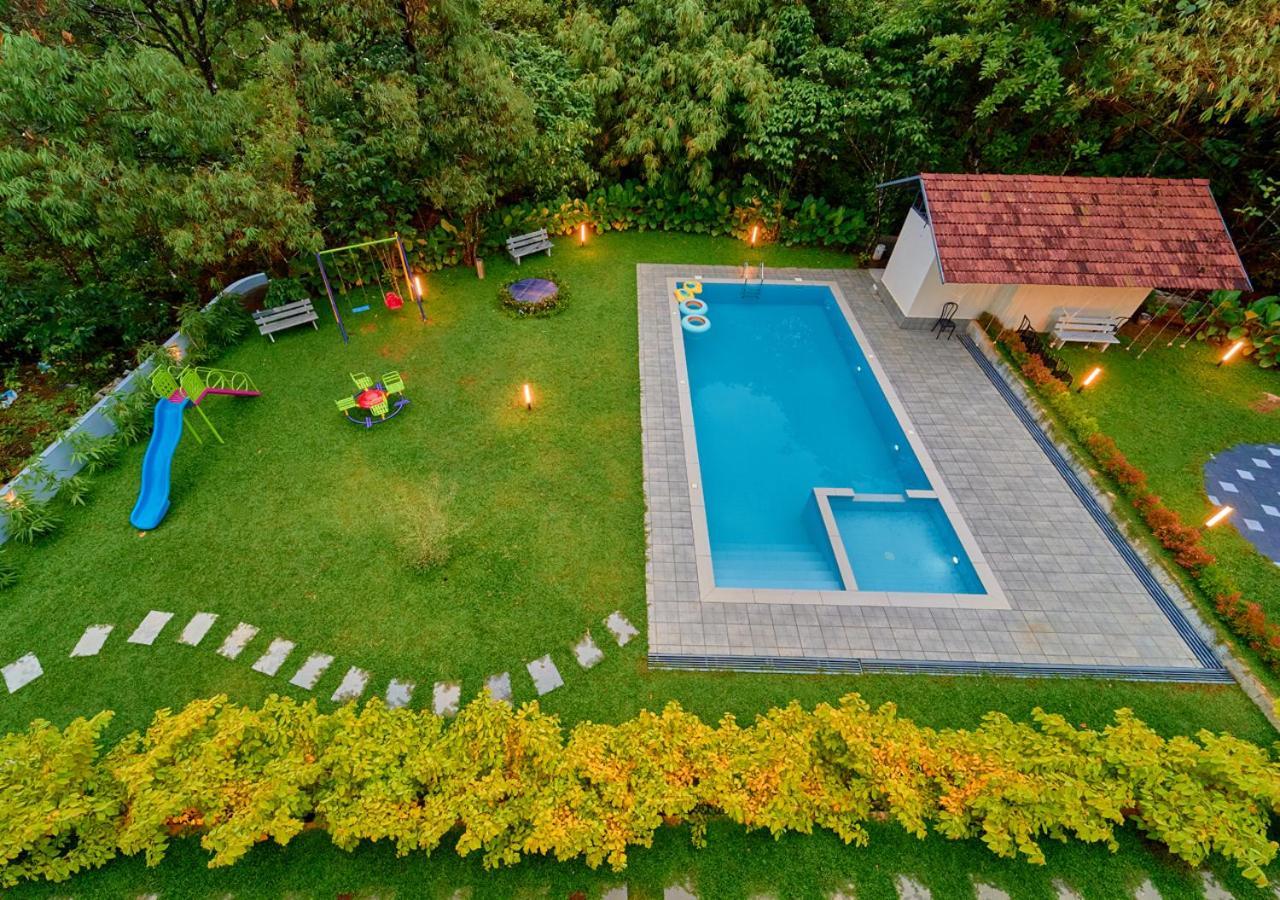 Glen Castle Vagamon Pool Resort By Voye Homes Extérieur photo
