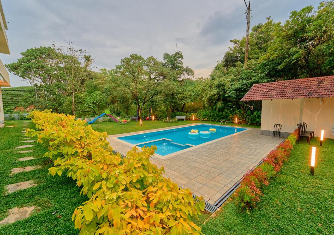 Glen Castle Vagamon Pool Resort By Voye Homes Extérieur photo
